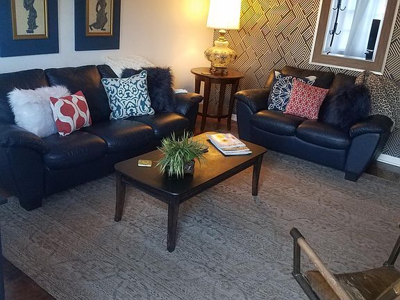 Living room shown with furniture
