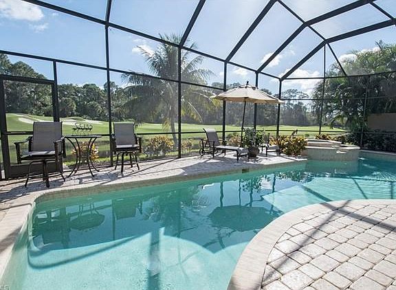Private water & golf course views from your brick paver deck.