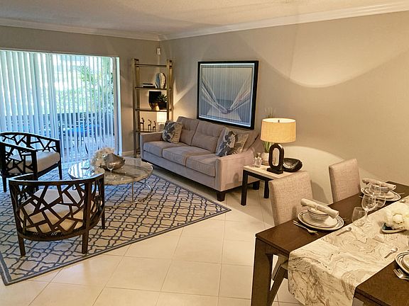 Living room with open concept layout dining room