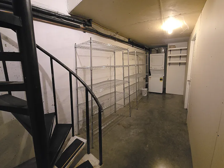 Spiral staircase to downstairs basement and laundry room