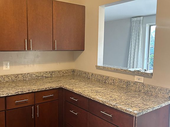 Upgraded cabinets with plenty of storage.