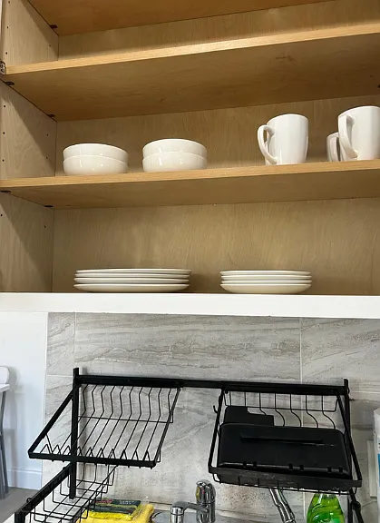 Kitchen sink with a dish rack for drying dishes.