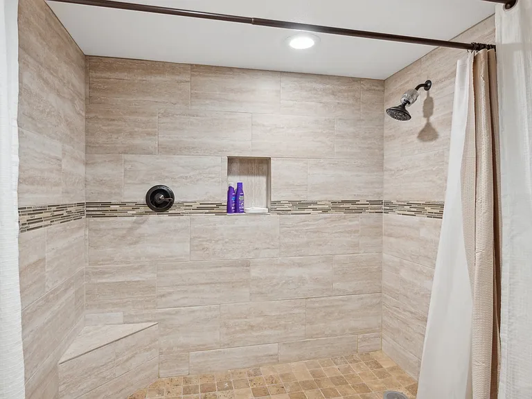 Massive and amazing spa-like shower! The best.