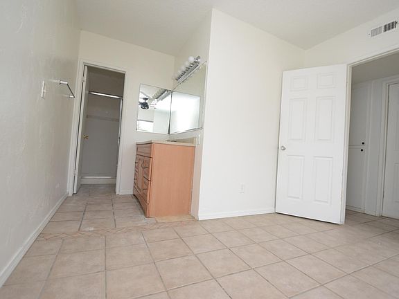 TILE SHOWER IN MASTER BATHROOM