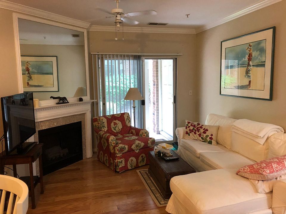 Living room opening to private terrace