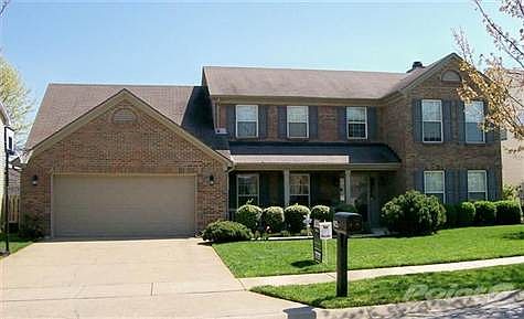 NEW PRICE!! All NEW Hardwood Flooring on 1st floor / Crown molding / tray ceilings / wainscotting / chair rail / ceramic tile / covered front porch / fireplace / formal living room or home office / 4 bedroom (Bonus Room) / 2.5 bath / separate utility room / large, fenced backyard / patio with 12'x14' Pergola / huge 22'x 26' garage / floored attic storage / level yard and driveway. Walk to Cluhouse and Pool. Quality Home! Great Price!!