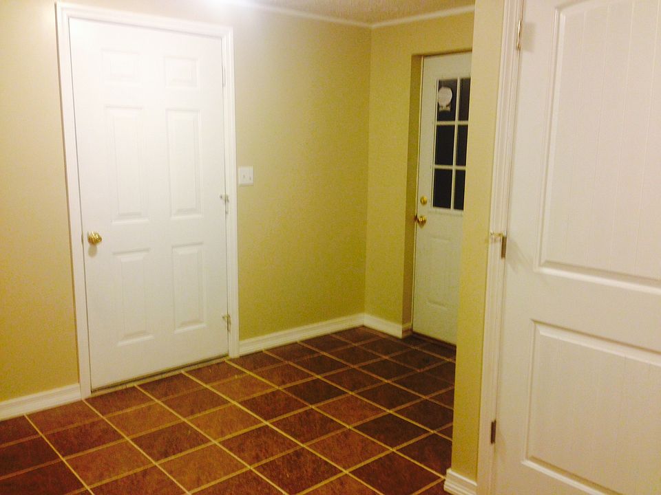 Outside entrance to unit next to garage door