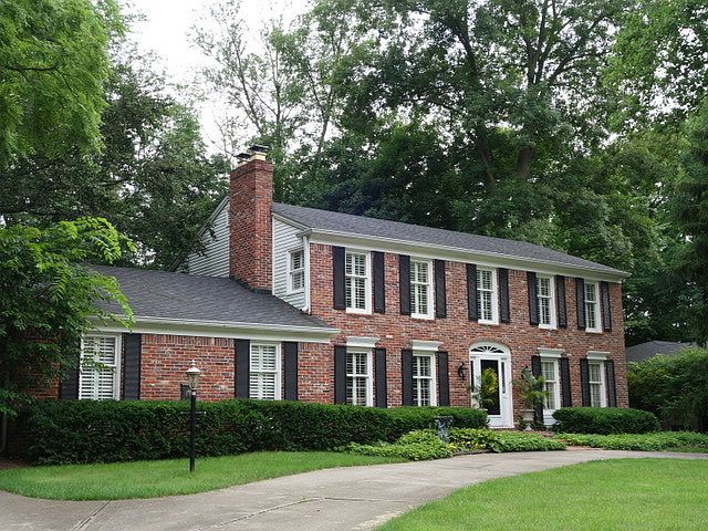 Brick Colonial circular drive