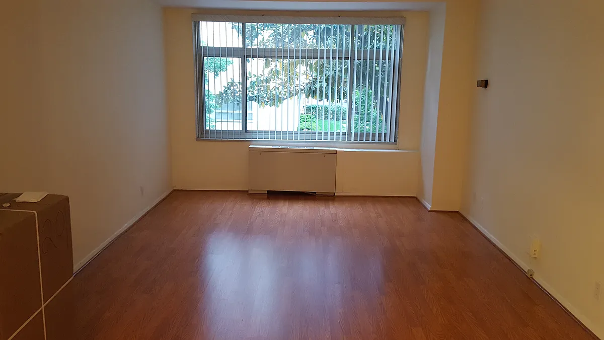 Spacious living room (can become 2nd bedroom) - 2401 H St NW #201