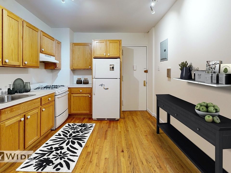 2nd image of 21 E 2nd St APT 11
