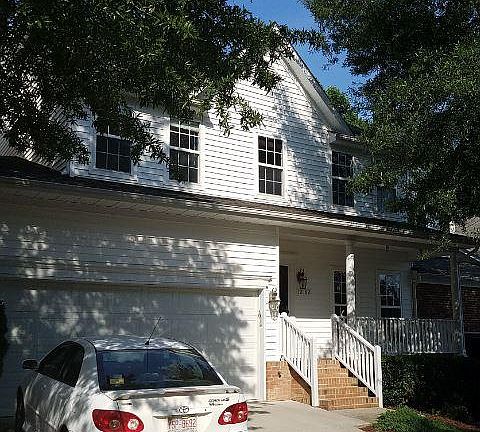 2 car garage and driveway parking. Covered porch..