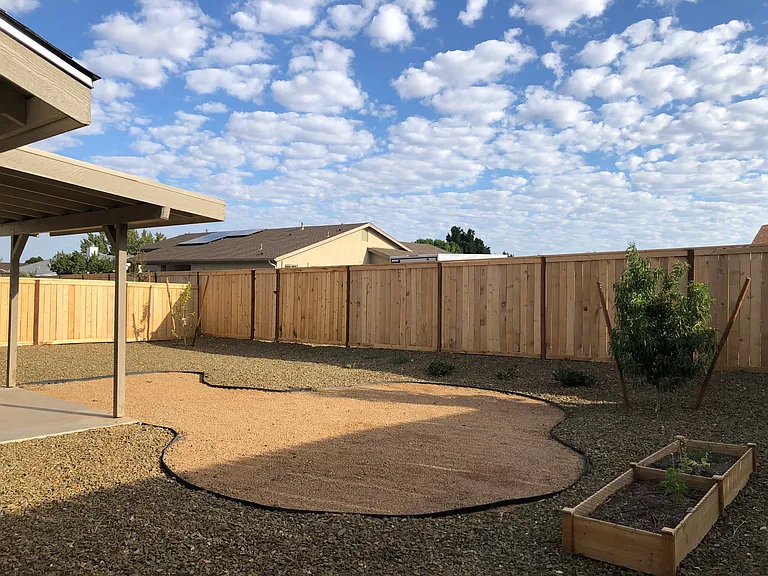 Private fenced backyard
