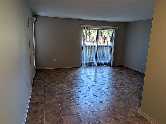View of living room facing the patio.