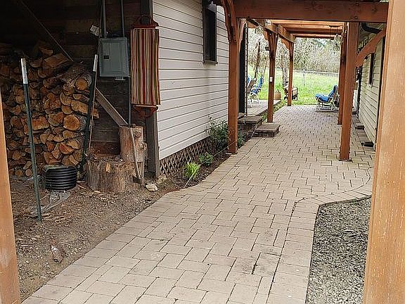 COVERED WALKWAY TO WOODSHED
