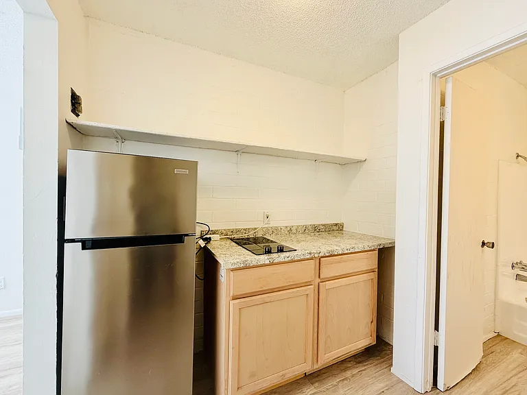Studios, 1 Bedrooms and 2 Bedrooms! Charming Community with Off Street Parking — Photo 7