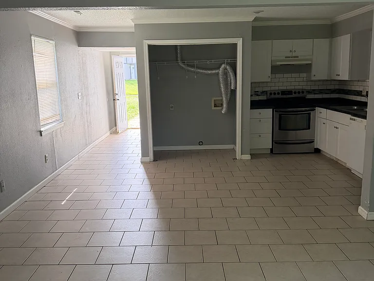 Spacious Kitchen with washer and dryer lockups.