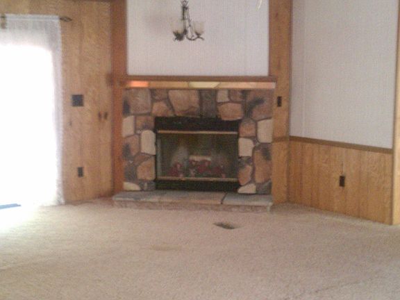 Living room w/ Fireplace
