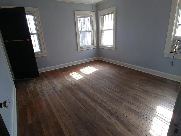 Upstairs bedroom with private staircase.