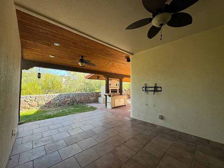 Walkout to backyard/outdoor kitchen.