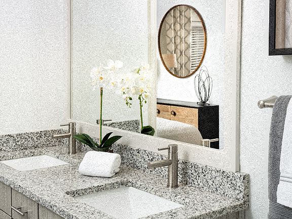 Granite countertops and brushed nickel hardware