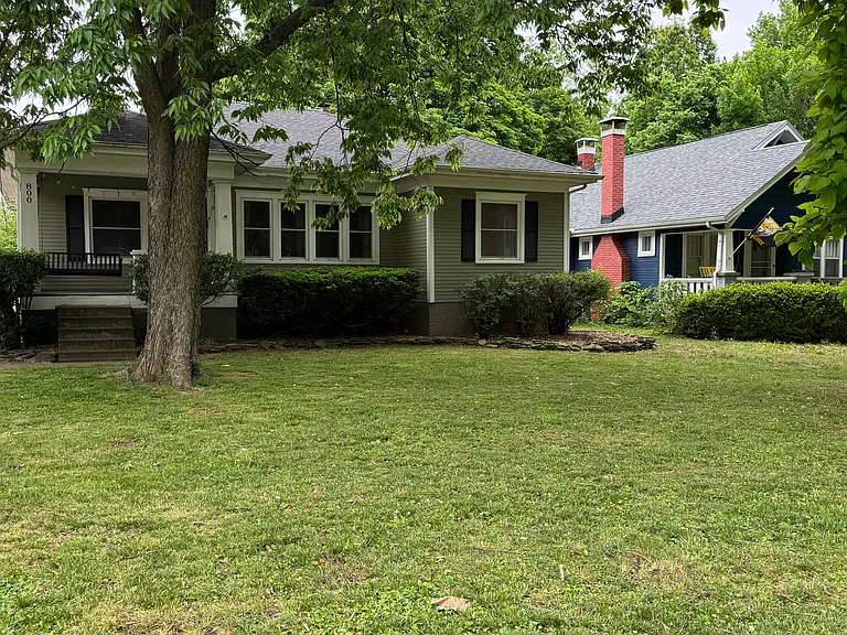 Front view from Fremont Ave, Landlord contracts Weedman to provide weed control and fertilization