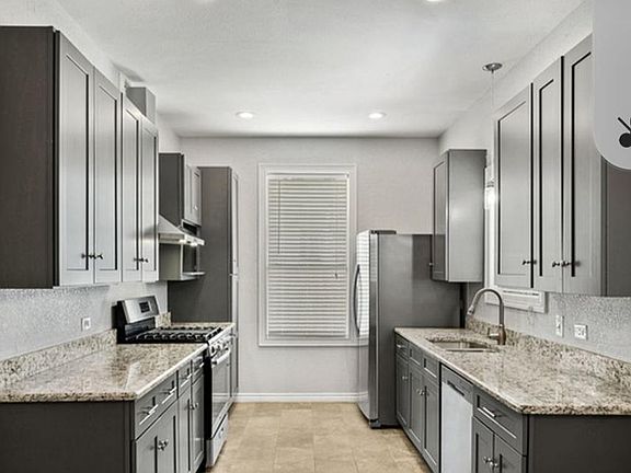 Kitchen with stainless steel appliances and granite countertops