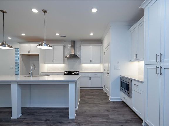 Gourmet kitchen, brand new townhome, ready to make yours in May June 2025 Pictures represent a previ