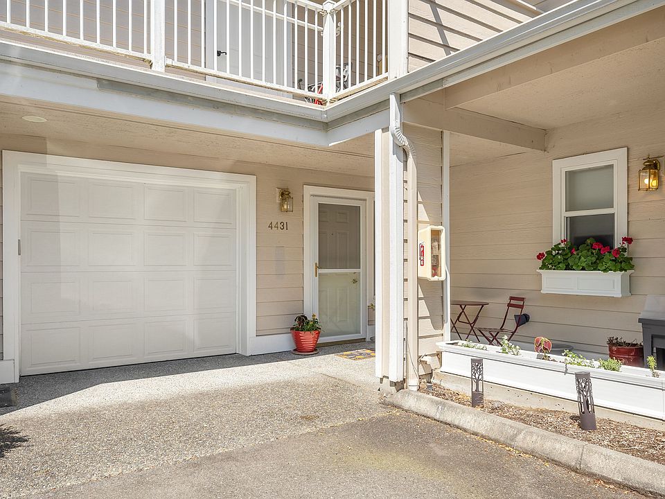 One car garage with direct access to the home. You can park in front of the garage as well.