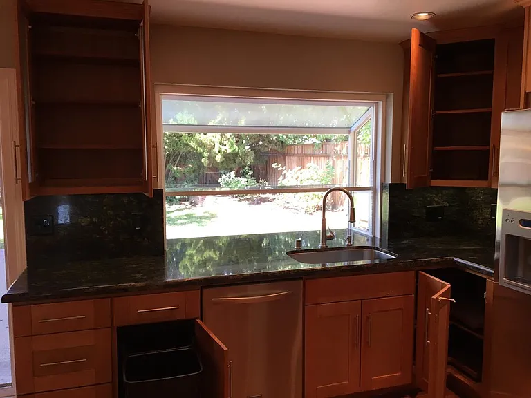 Lined drawers, lazy suzans in corner storage, floor to ceili