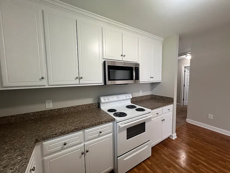 Kitchen with all appliances furnished...stove.. refrigerator....microwave....dishwasher!