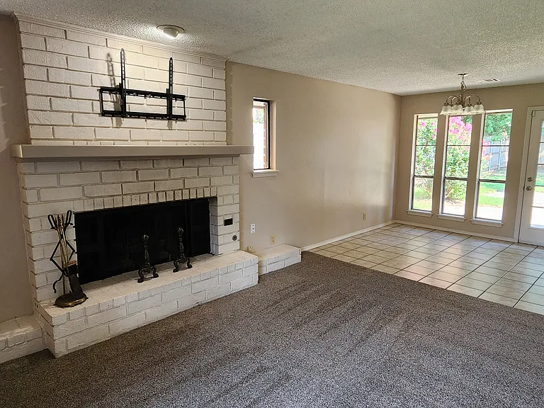 LIVING ROOM OPENS TO EATING AREA & BACK PATIO