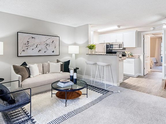 Dance through our open floor plans, where wood-style floors unite your living room and kitchen in perfect harmony. Redefine your style of living!