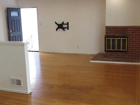 View from Dining Room Toward Living Room with Skylight