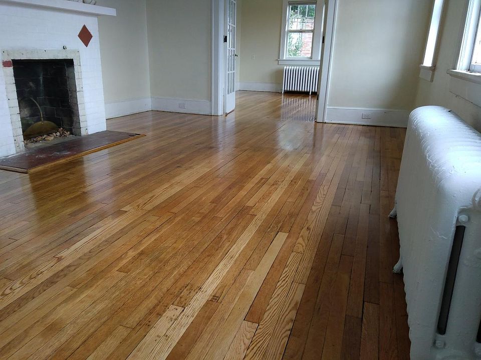 Living room, dining room, and fireplace