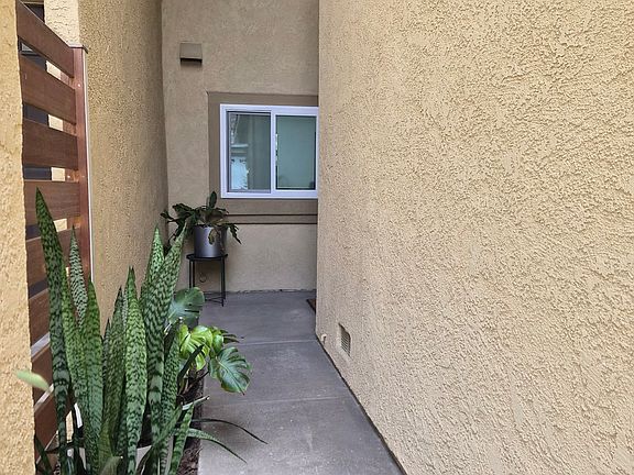 Recessed entrance for privacy.