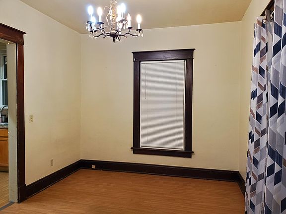 Formal Dining with New floors, blinds, and energy windows