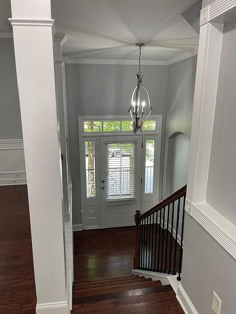 Entry Foyer, stairs leading to main level
