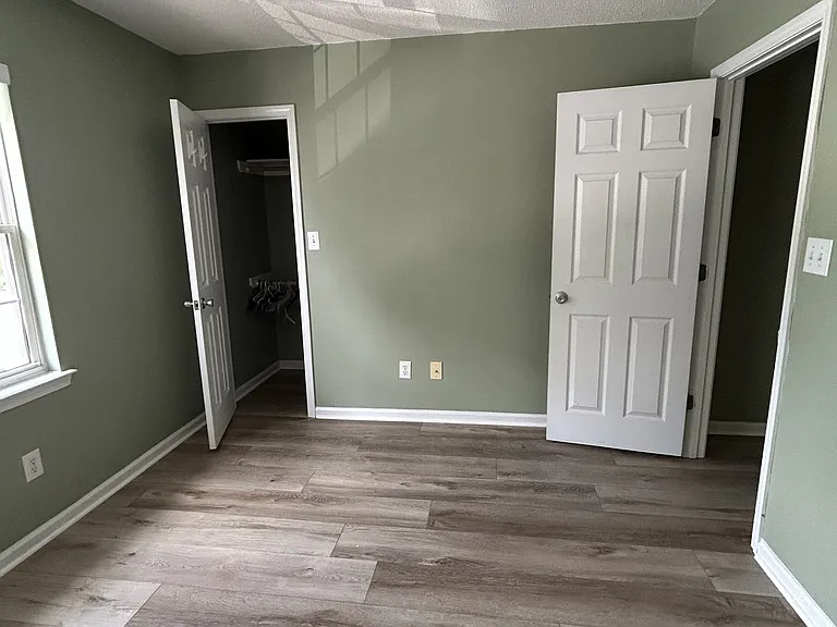 Bedroom 2 from different angle showing closet in left corner