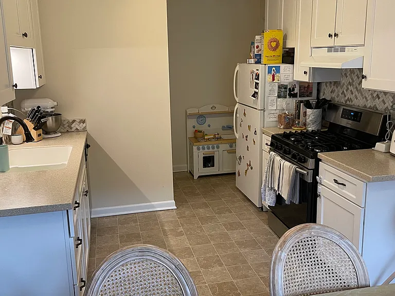 Kitchen - gas range , dishwasher,updated counter tops & sink, refrigerator/top freezer