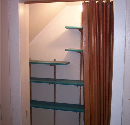 Walk-in closet in bathroom