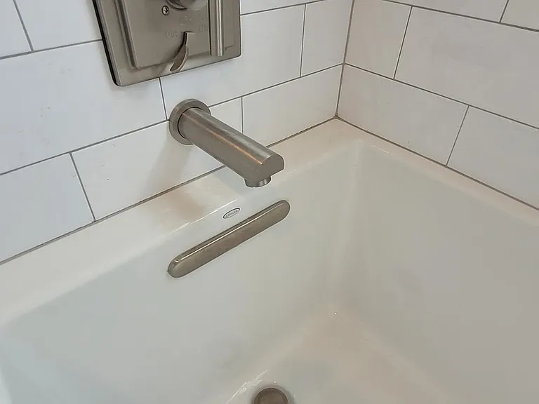 15" soaking tub with brushed nickel fixtures!
