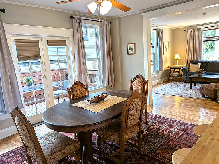 Dining Room with French doors that lead to deck with view toward Living Room