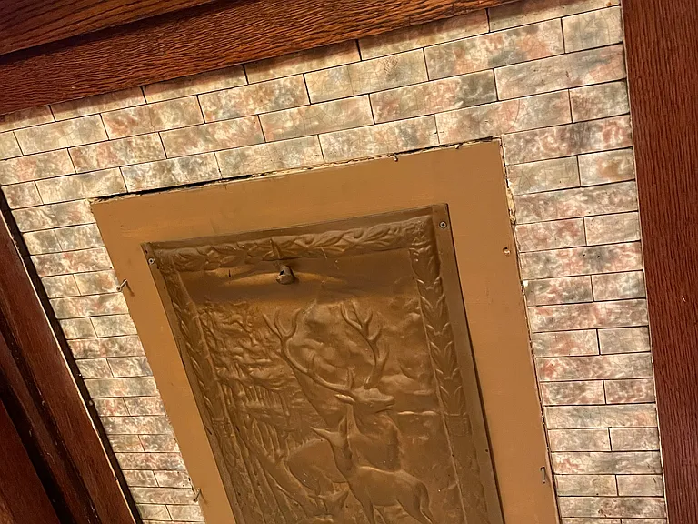 original tile from the 1920's and antique brass firescreen