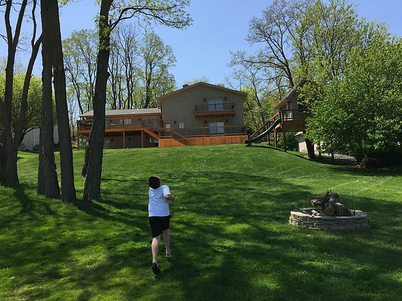 Huge back yard with fire pit