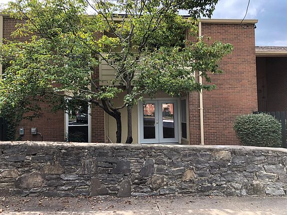 Entrance. Dogwood tree has gorgeous white blooms in spring, shade in the summer, and terrific fall colors as well.