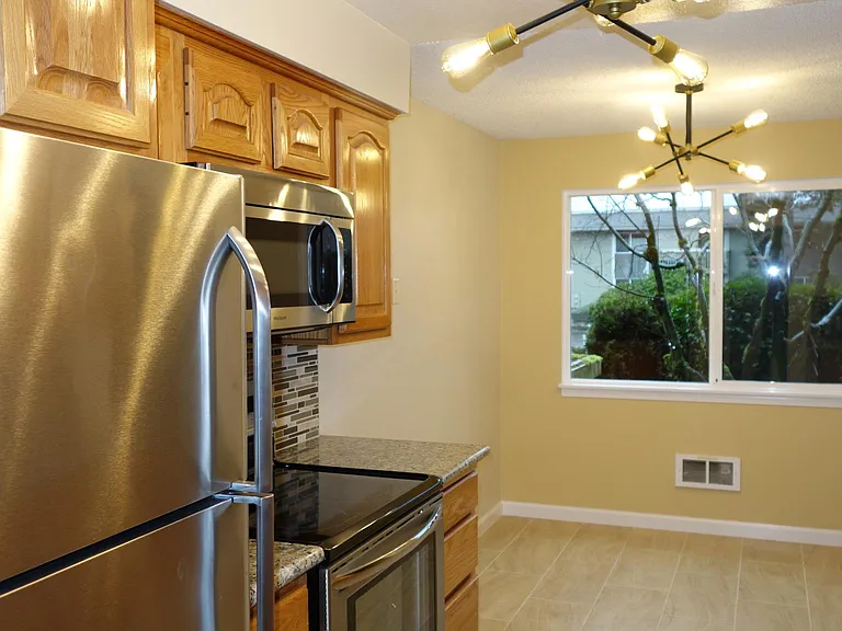 Modern Kitchen with Stainless Steal Appliance Package