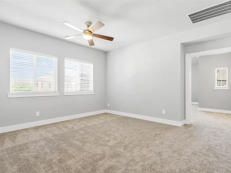 Living Area 3, doors leading to Master Suite