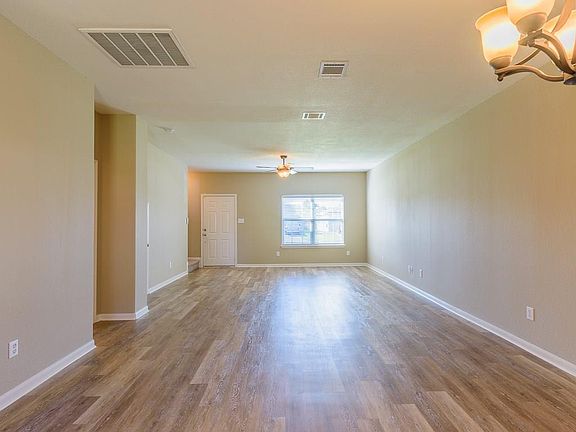 The first floor has recent vinyl plank flooring. Easy to keep and very attractive. The family room is spacious and light.