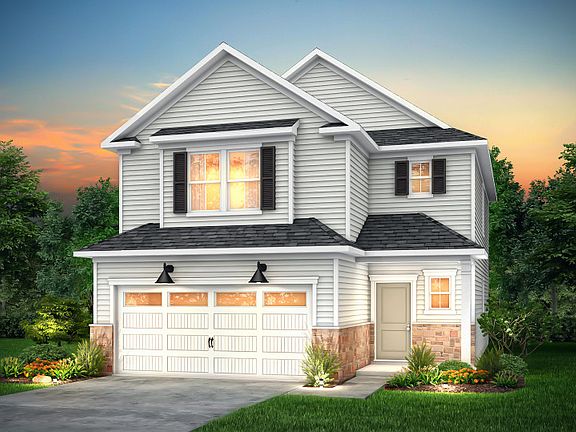 Harris Exterior LC2H features siding, brickstone accents, covered front porch and 2 car garage