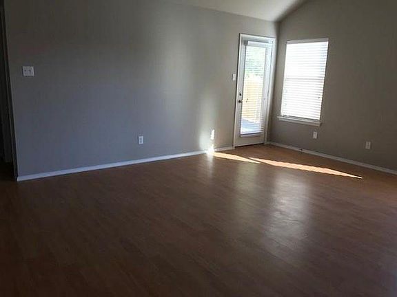Living Room with back door to patio